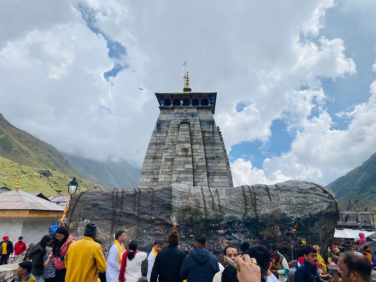 Kedarnath Temple at sunrise with golden light