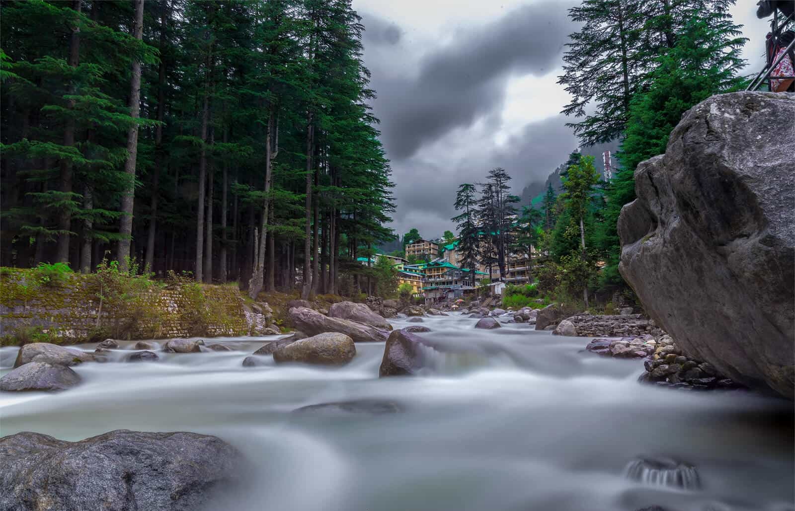 Riverside cafes and mountains in Kasol